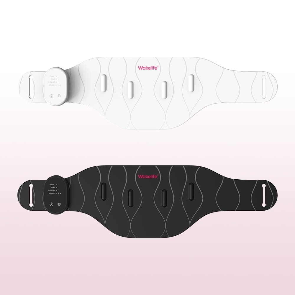 Black and white silicone red light therapy belts with wireless magnetic controllers laid flat