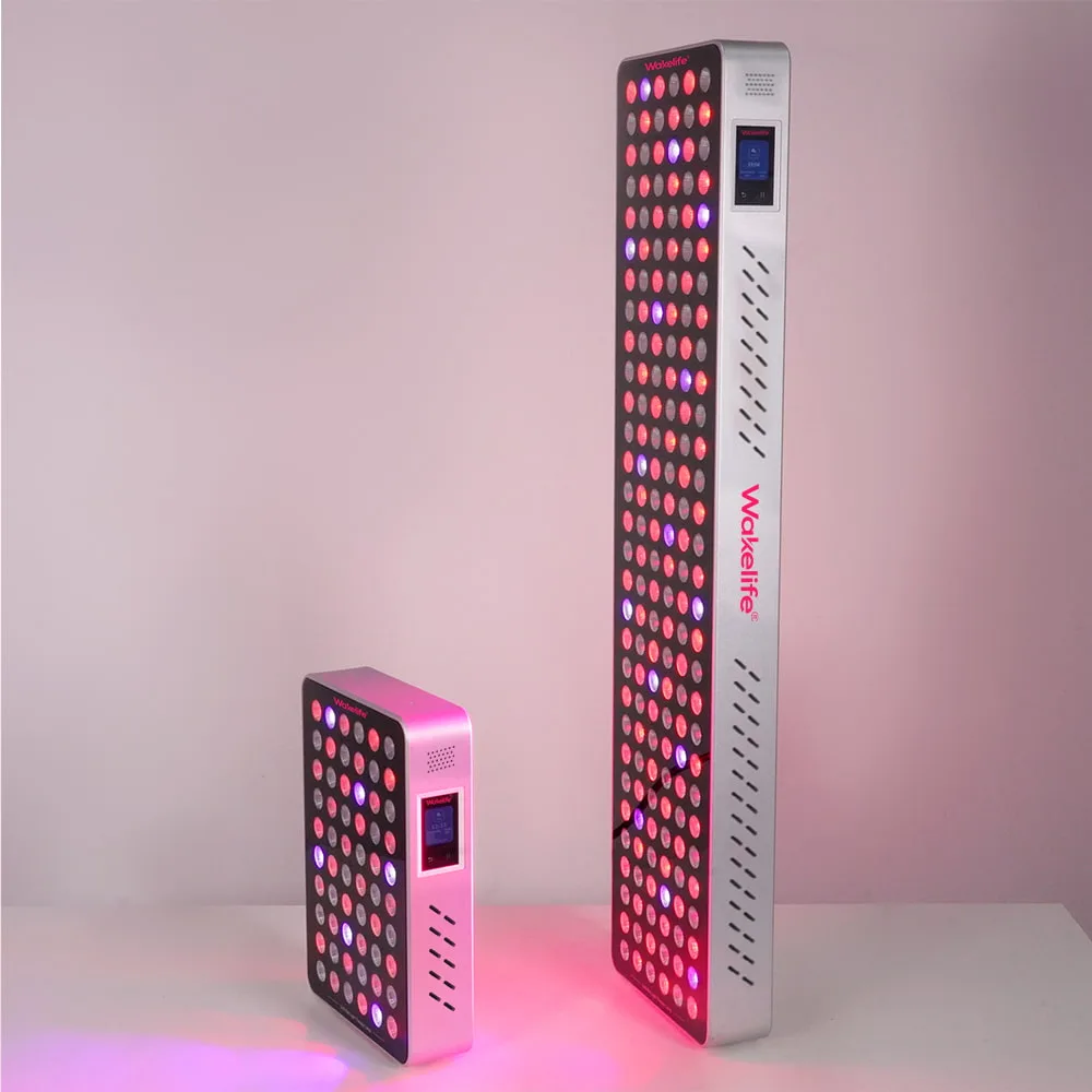 Wakelife BK300 and BK900 UVB tanning panels with multi-wavelength LEDs illuminated for professional tanning and light therapy use