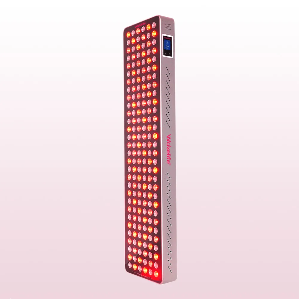 Wakelife BK900 UVB tanning panel illuminated with red and purple multi-wavelength LED light output