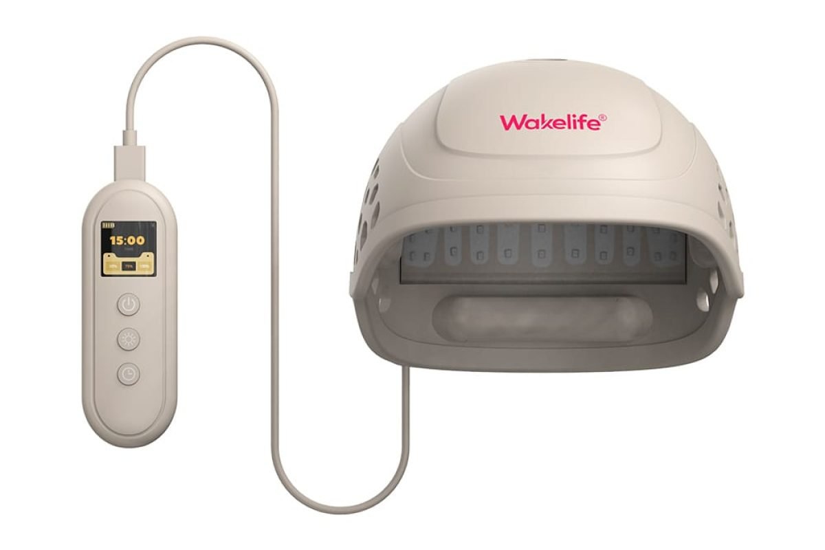HC03 laser hair growth cap with handheld TFT controller showing timer and brightness settings